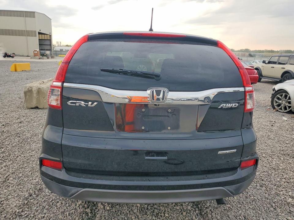 Photo 6 from auction – 2016 HONDA CR-V with VIN 2HKRM4H44GH690620