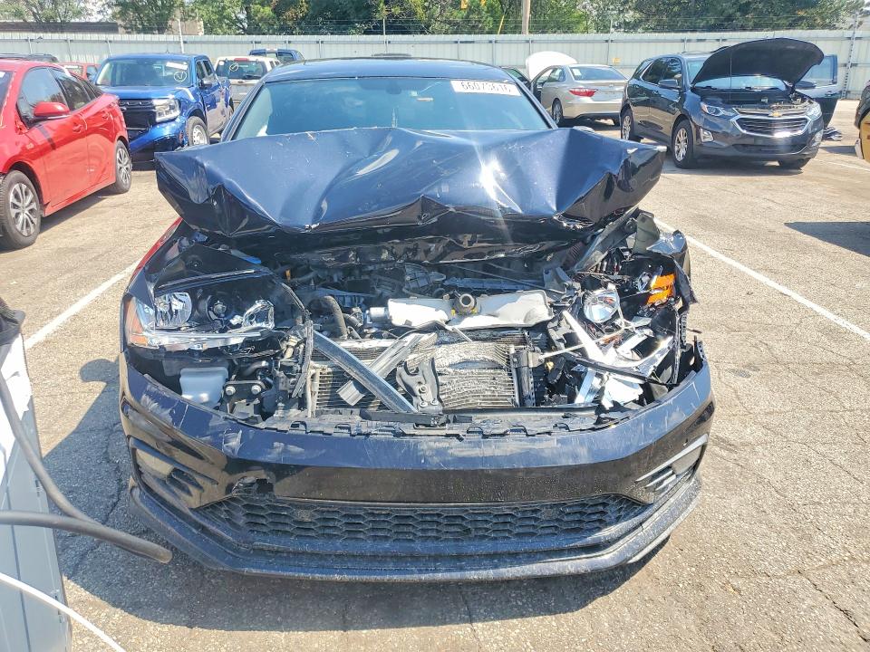 Photo 5 from auction – 2017 VOLKSWAGEN JETTA with VIN 3VW4T7AJXHM413526