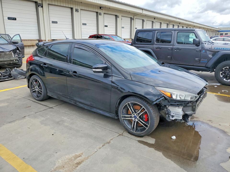 Photo 4 from auction – 2016 FORD FOCUS with VIN 1FADP3L99GL371245