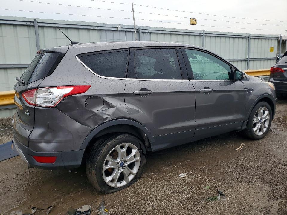 Photo 3 from auction – 2013 FORD ESCAPE with VIN 1FMCU9H97DUC95052