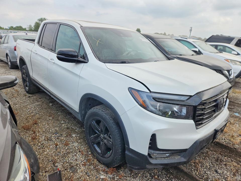 Photo 4 from auction – 2023 HONDA RIDGELINE with VIN 5FPYK3F80PB020599