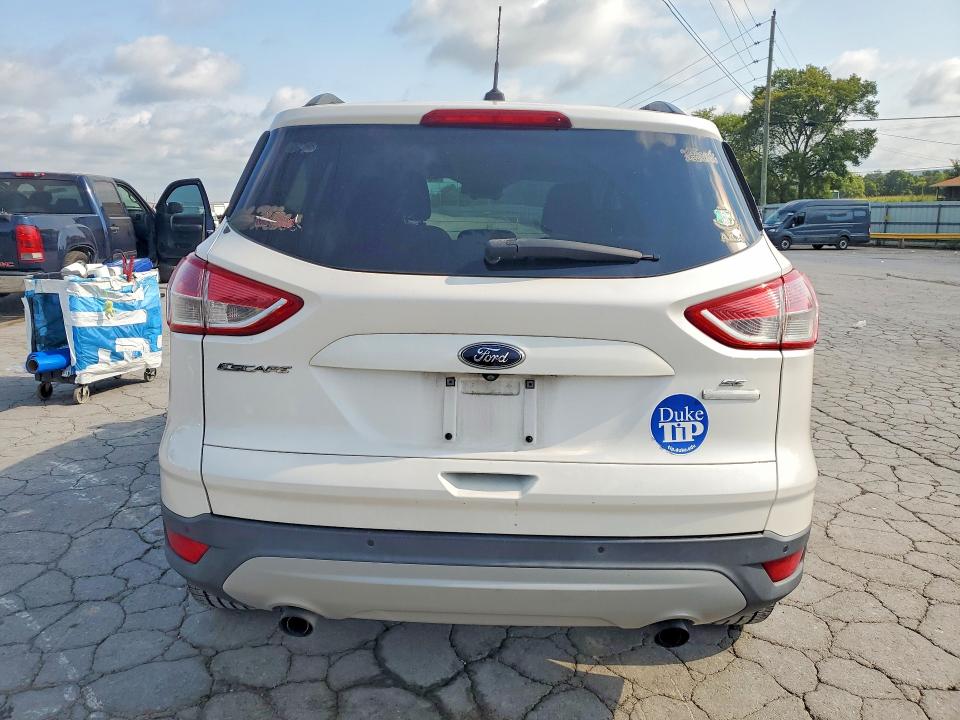 Photo 6 from auction – 2016 FORD ESCAPE with VIN 1FMCU0GX1GUC62855