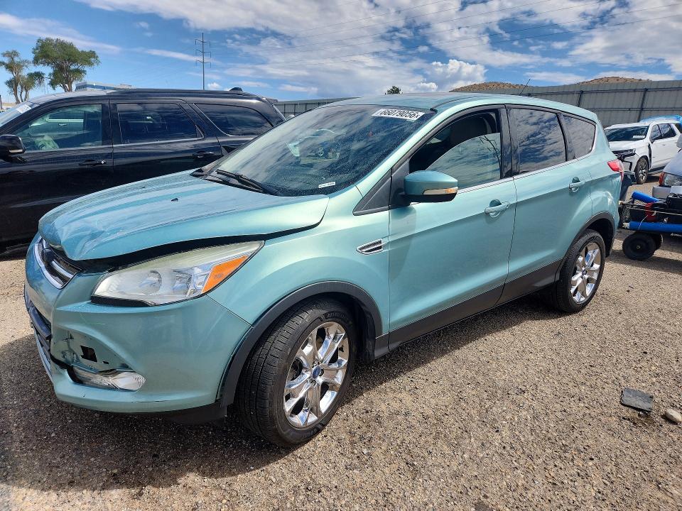 FORD ESCAPE 2013 with VIN 1FMCU9HX3DUC71748 - Photo from auction