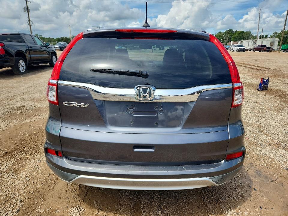 Photo 6 from auction – 2015 HONDA CR-V with VIN 2HKRM3H74FH528005