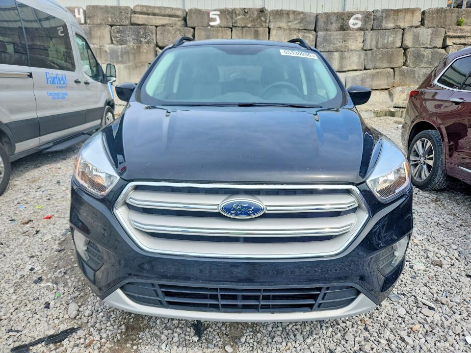 Photo 5 from auction – 2018 FORD ESCAPE with VIN 1FMCU9GD1JUC61531