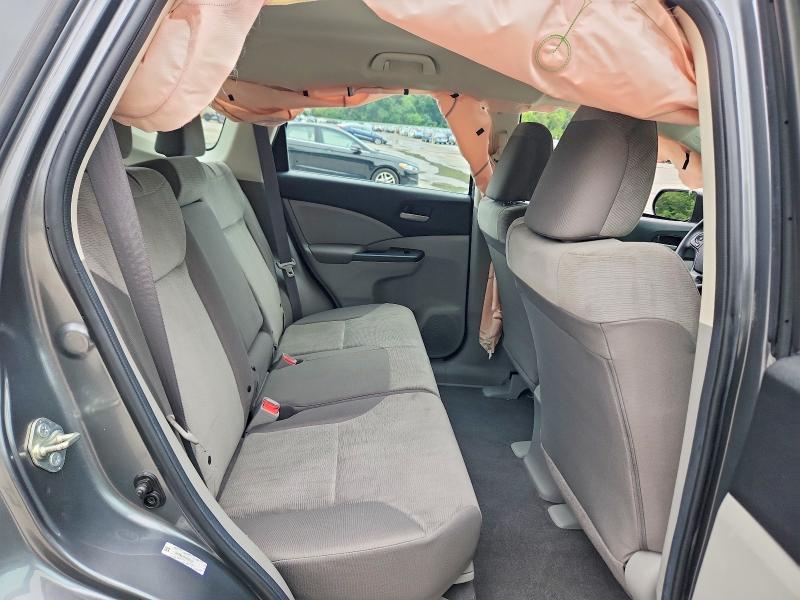 Photo 11 from auction – 2014 HONDA CR-V with VIN 2HKRM4H31EH670121
