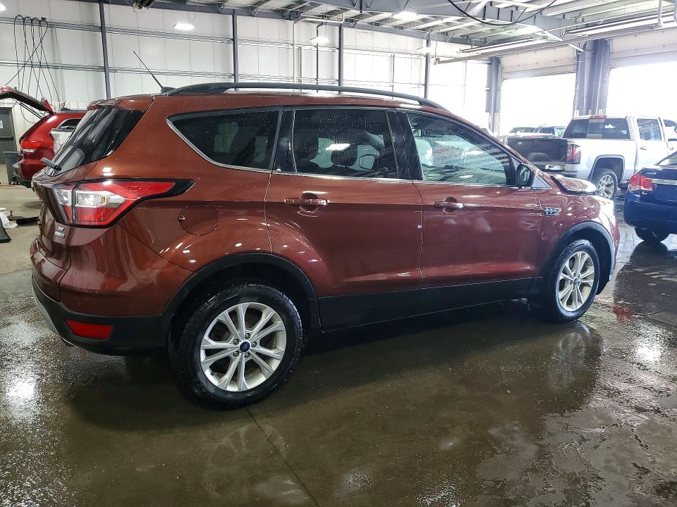 Photo 3 from auction – 2018 FORD ESCAPE with VIN 1FMCU9GD1JUC48665