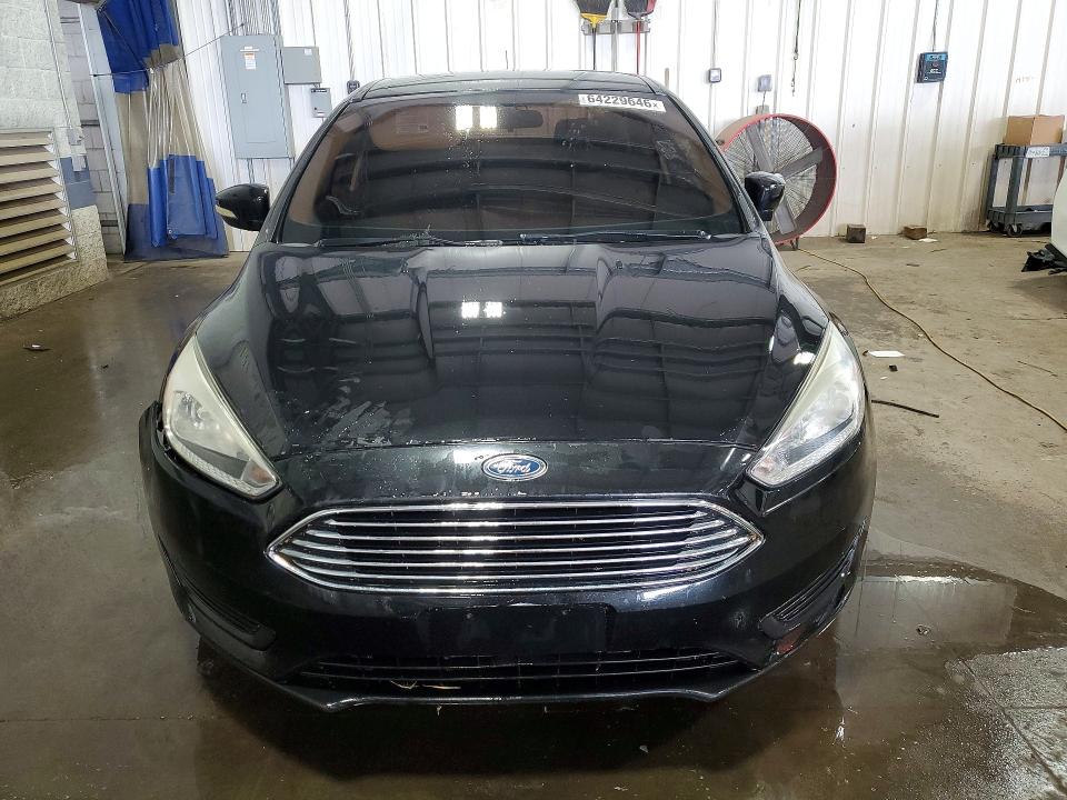 Photo 5 from auction – 2015 FORD FOCUS with VIN 1FADP3F28FL375090