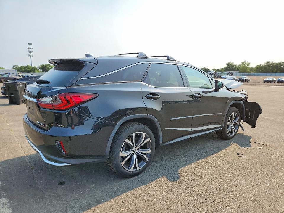 Photo 3 from auction – 2022 LEXUS RX with VIN JTJHZKFA8N2042431