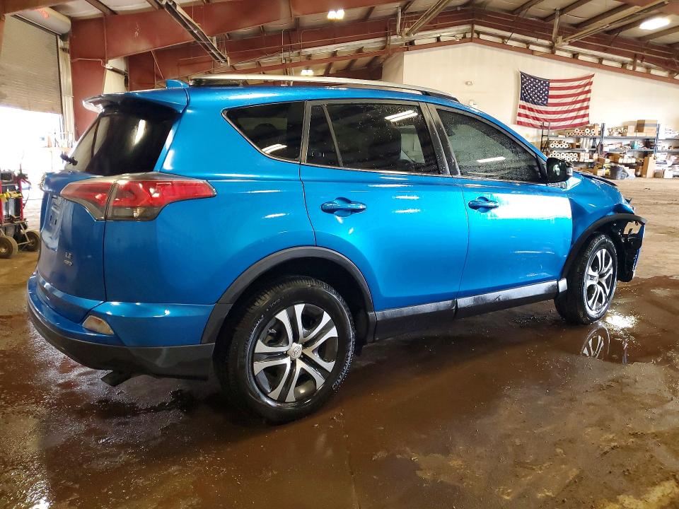 Photo 3 from auction – 2017 TOYOTA RAV4 with VIN JTMBFREV7HJ135417