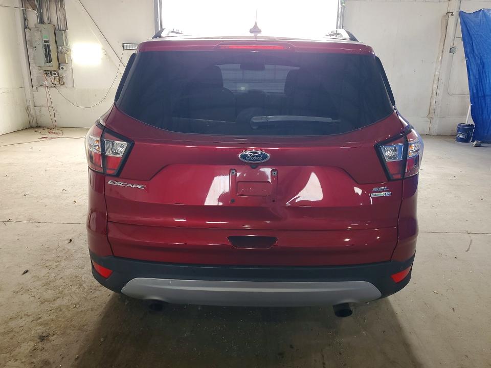 Photo 6 from auction – 2018 FORD ESCAPE with VIN 1FMCU9HD0JUD02651