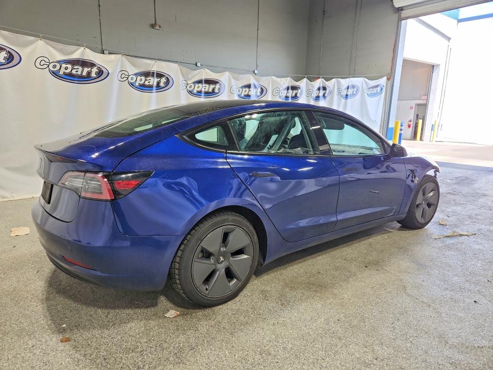Photo 3 from auction – 2022 TESLA MODEL 3 with VIN 5YJ3E1EA4NF370365