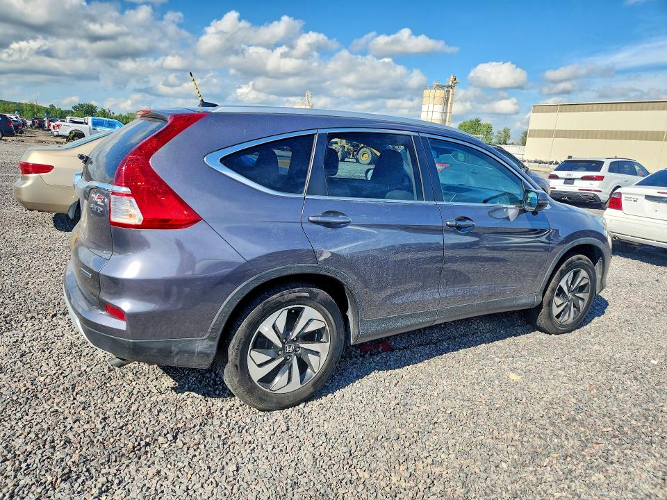Photo 3 from auction – 2016 HONDA CR-V with VIN 5J6RM4H97GL071785