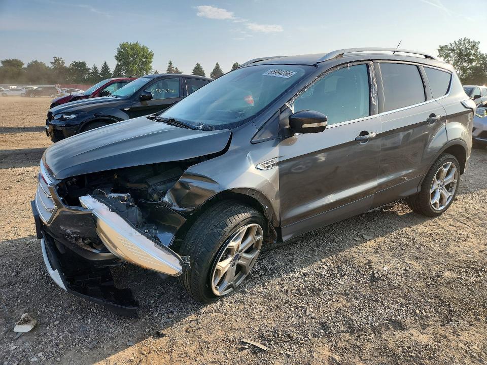 FORD ESCAPE 2017 with VIN 1FMCU9J95HUA36804 - Photo from auction