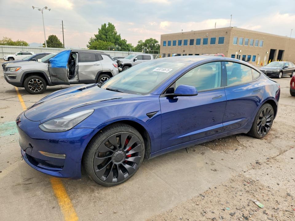 TESLA MODEL 3 2022 with VIN 5YJ3E1EC6NF274402 - Photo from auction
