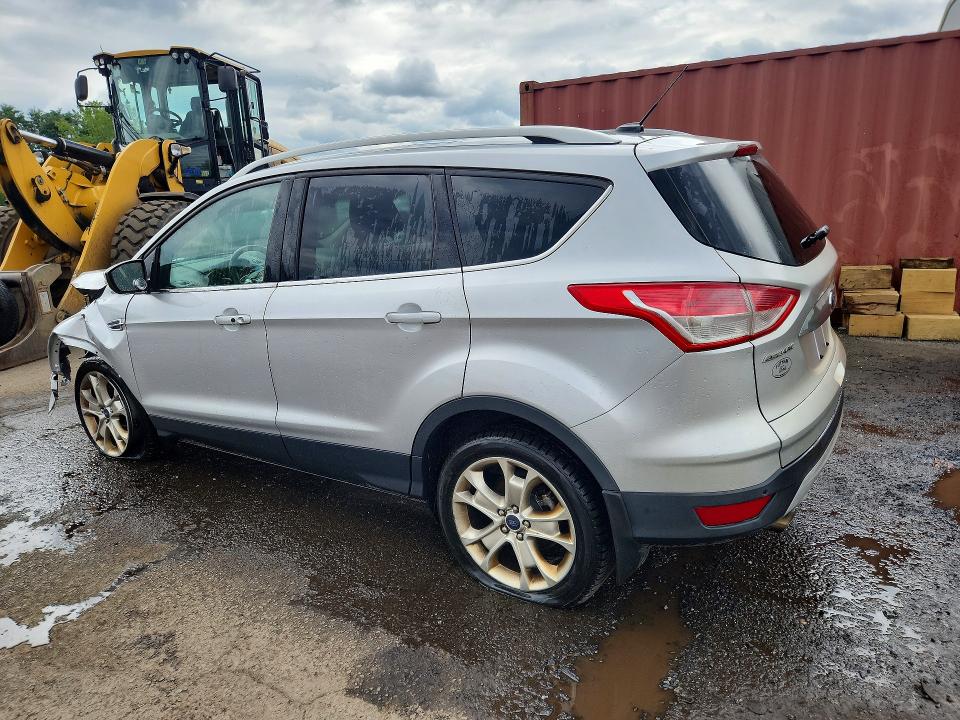 Photo 2 from auction – 2016 FORD ESCAPE with VIN 1FMCU9J92GUA58256