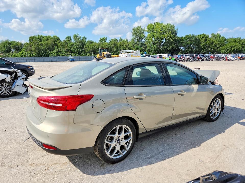 Photo 3 from auction – 2015 FORD FOCUS with VIN 1FADP3F2XFL255453
