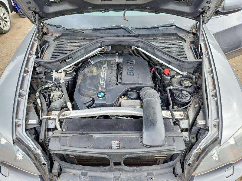Photo 11 from auction – 2013 BMW X5 with VIN 5UXZV4C59D0B09765