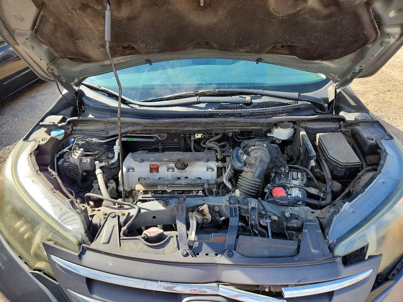 Photo 12 from auction – 2014 HONDA CR-V with VIN 2HKRM3H50EH550807