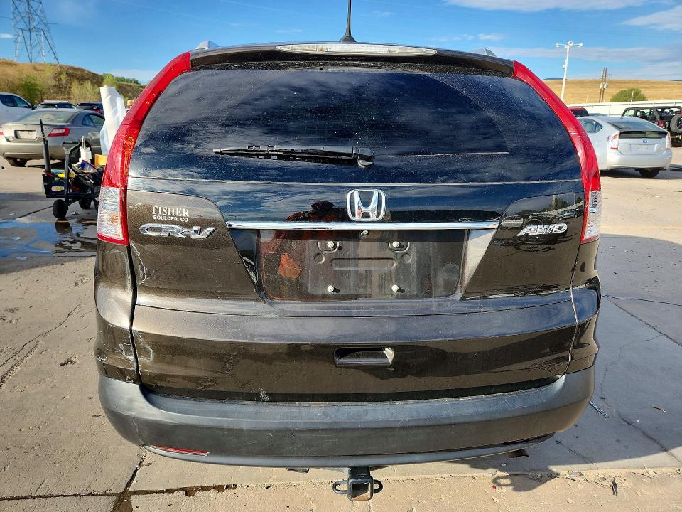 Photo 6 from auction – 2014 HONDA CR-V with VIN 2HKRM4H78EH665954