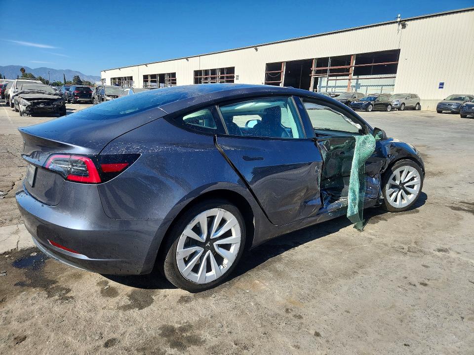 Photo 3 from auction – 2023 TESLA MODEL 3 with VIN 5YJ3E1EAXPF452782