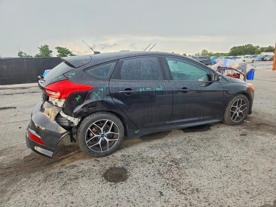 Photo 3 from auction – 2016 FORD FOCUS with VIN 1FADP3K23GL379250