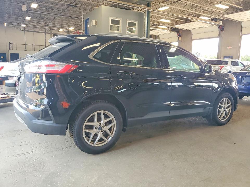 Photo 3 from auction – 2021 FORD EDGE with VIN 2FMPK4J94MBA33712