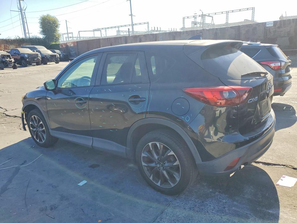 Photo 2 from auction – 2016 MAZDA CX-5 with VIN JM3KE2DY4G0815311