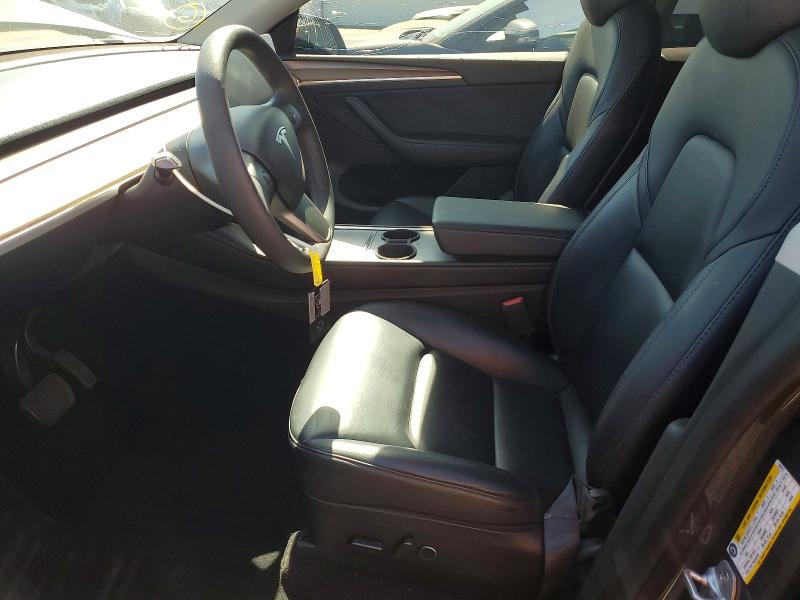 Photo 7 from auction – 2023 TESLA MODEL Y with VIN 7SAYGAEEXPF585211