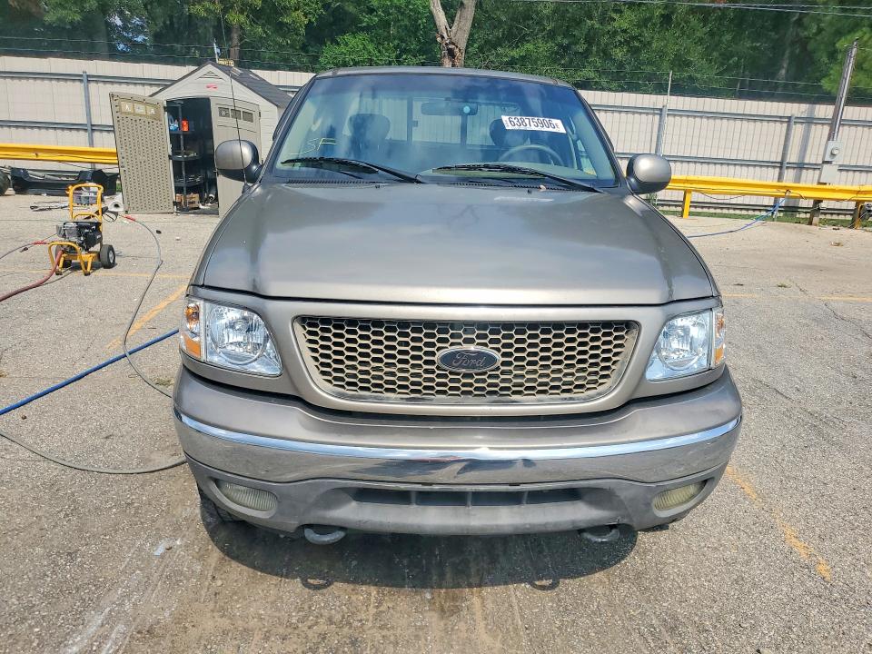 Photo 5 from auction – 2003 FORD F150 with VIN 1FTRX18L03NB76660