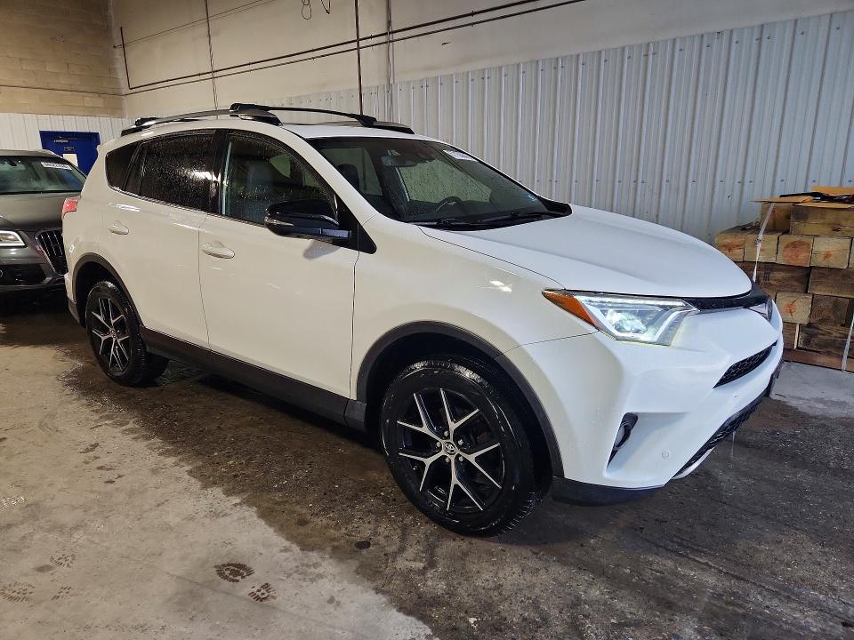 Photo 4 from auction – 2018 TOYOTA RAV4 with VIN JTMJFREV6JD228381