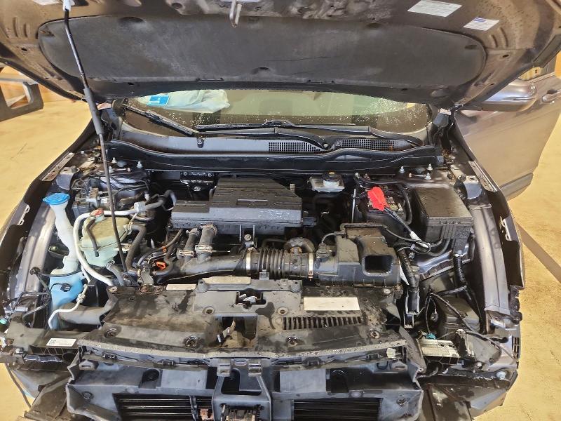 Photo 12 from auction – 2017 HONDA CR-V with VIN 5J6RW2H81HL004882