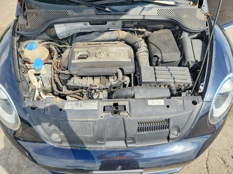 Photo 11 from auction – 2013 VOLKSWAGEN BEETLE with VIN 3VWVA7AT2DM638626