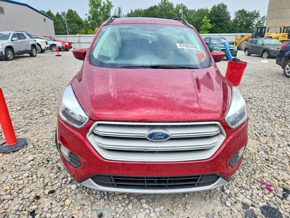 Photo 5 from auction – 2018 FORD ESCAPE with VIN 1FMCU9GD0JUC18671