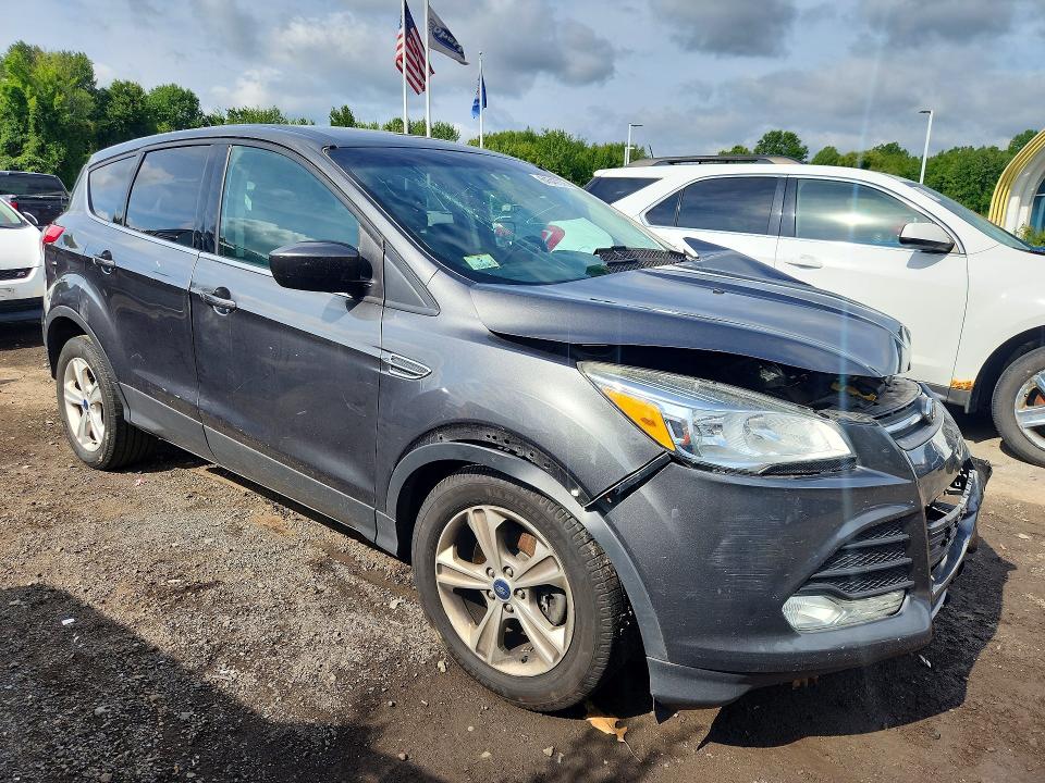 Photo 4 from auction – 2015 FORD ESCAPE with VIN 1FMCU9GX6FUA82208