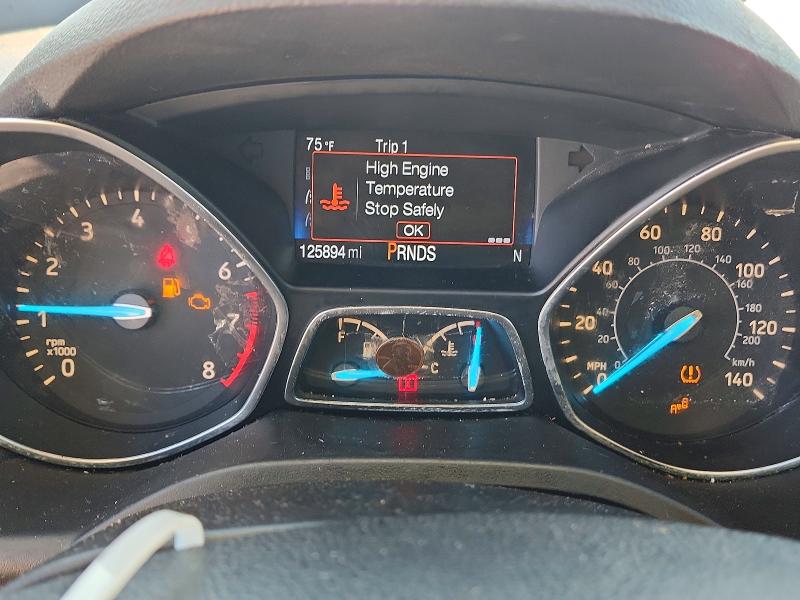 Photo 9 from auction – 2017 FORD ESCAPE with VIN 1FMCU0GDXHUC59105
