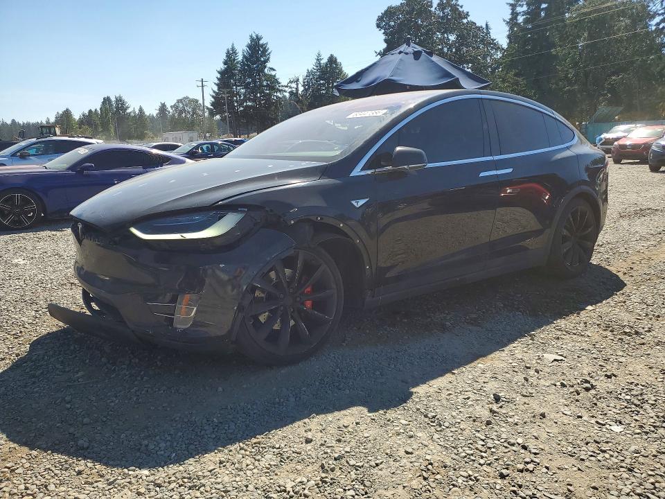 TESLA MODEL X 2016 with VIN 5YJXCBE4XGF006980 - Photo from auction