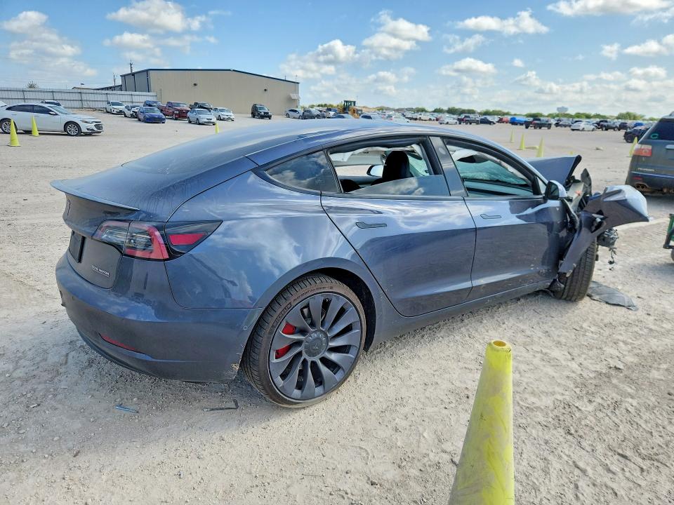 Photo 3 from auction – 2022 TESLA MODEL 3 with VIN 5YJ3E1EC8NF119947
