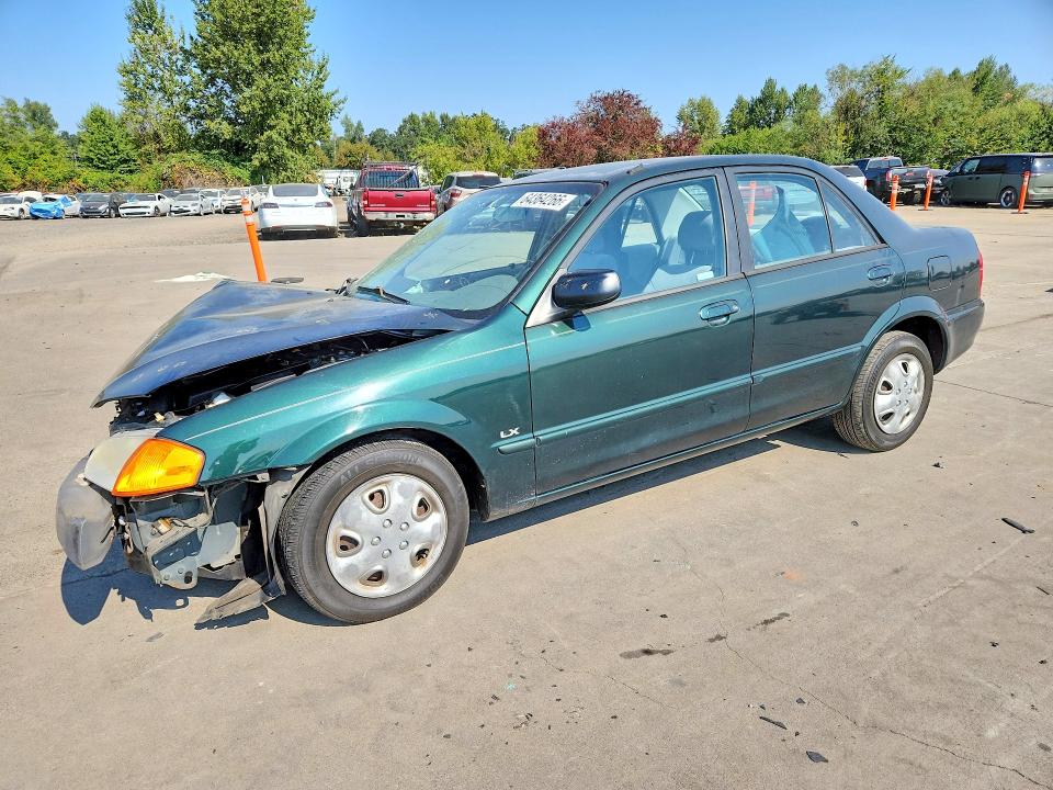 MAZDA PROTEGE 1999 con VIN JM1BJ2228X0132384 - Foto de la subasta