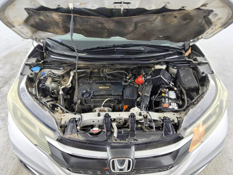 Photo 12 from auction – 2016 HONDA CR-V with VIN 2HKRM3H36GH520857