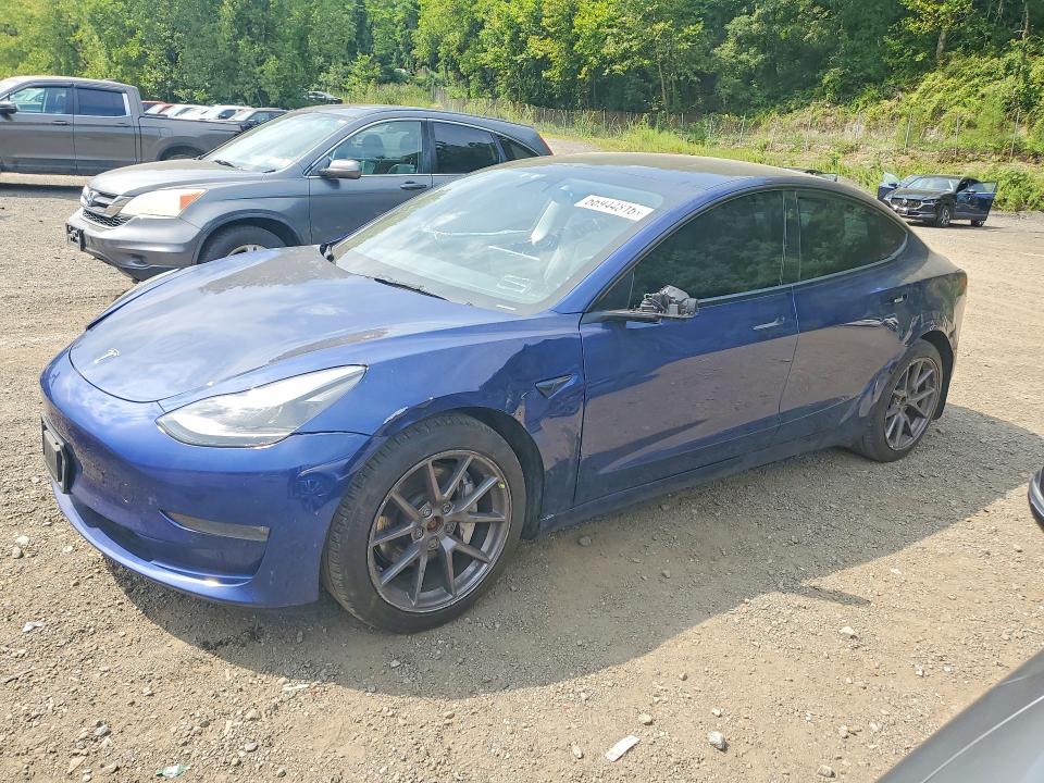 TESLA MODEL 3 2022 with VIN 5YJ3E1EBXNF334995 - Photo from auction