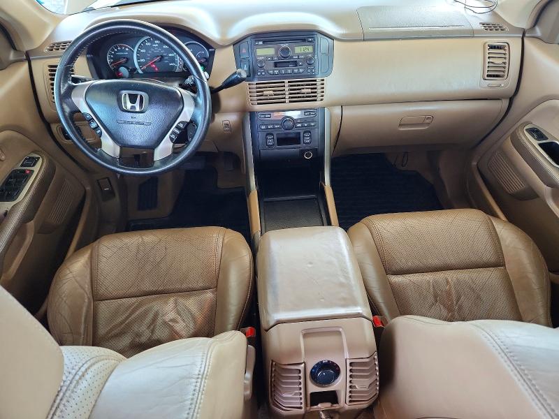 Photo 8 from auction – 2004 HONDA PILOT with VIN 2HKYF18594H560289