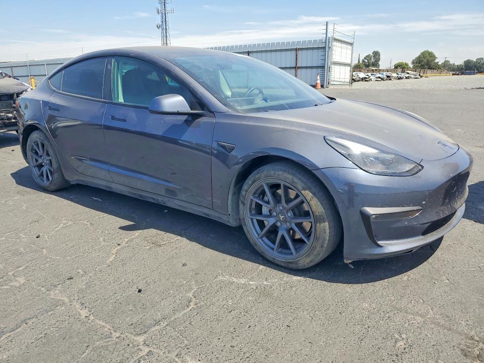 Photo 4 from auction – 2021 TESLA MODEL 3 with VIN 5YJ3E1EB5MF874835