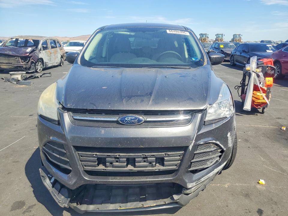 Photo 5 from auction – 2015 FORD ESCAPE with VIN 1FMCU9GX4FUC10011