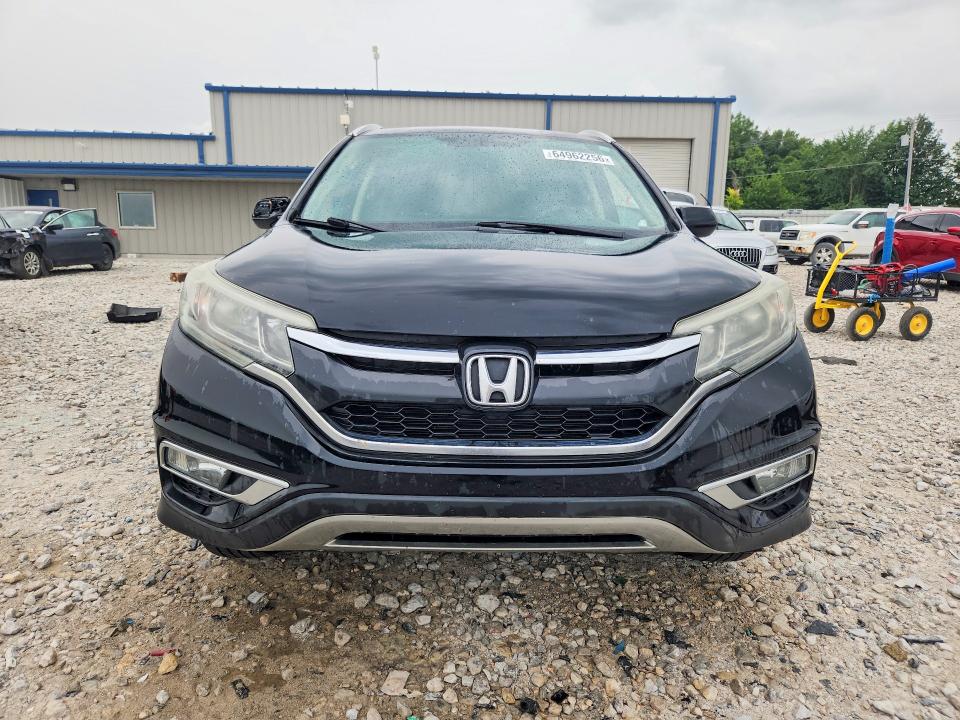 Photo 5 from auction – 2015 HONDA CR-V with VIN 2HKRM4H70FH611484