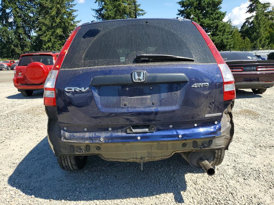 Photo 6 from auction – 2011 HONDA CR-V with VIN 5J6RE4H40BL036824