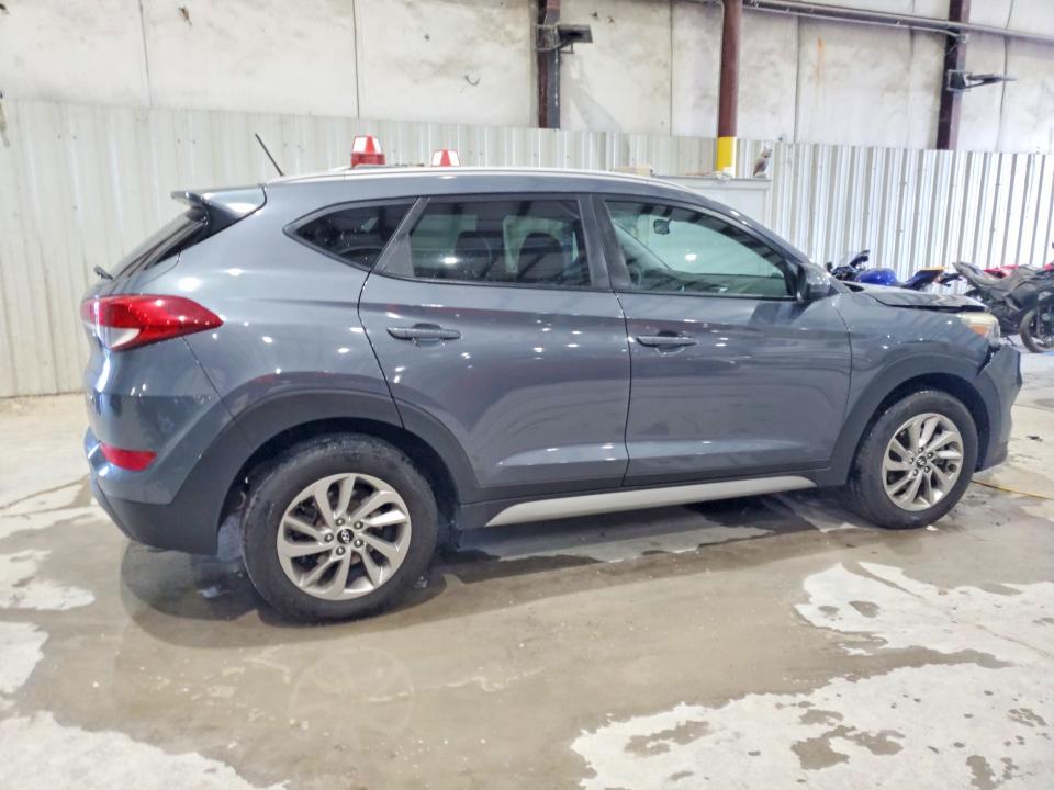 Photo 3 from auction – 2017 HYUNDAI TUCSON with VIN KM8J3CA40HU585077