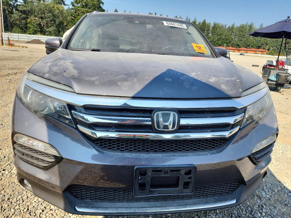 Photo 5 from auction – 2017 HONDA PILOT with VIN 5FNYF6H92HB034817