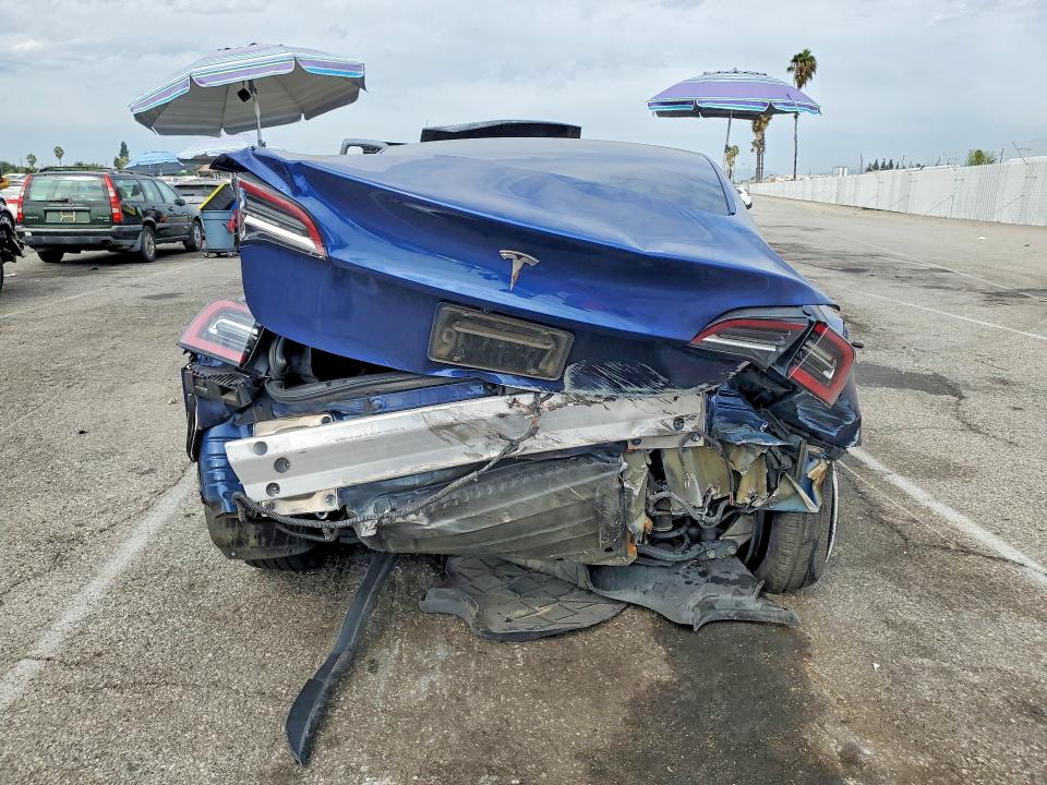 Photo 6 from auction – 2022 TESLA MODEL 3 with VIN 5YJ3E1EAXNF372721