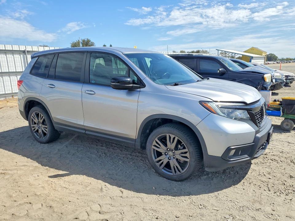 Photo 4 from auction – 2021 HONDA PASSPORT with VIN 5FNYF8H55MB033535